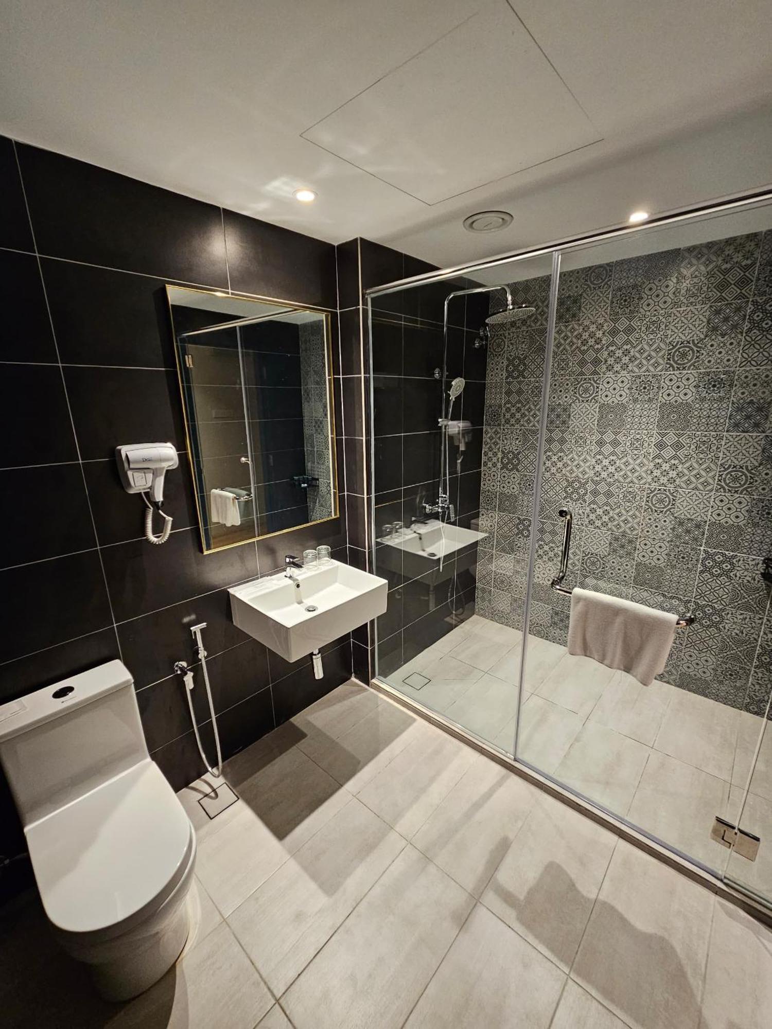 Le'Genda Hotel كاجانغ الغرفة الصورة